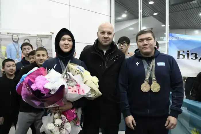 Столичные спортсмены, защищавшие честь страны в Японии, вернулись домой (7)