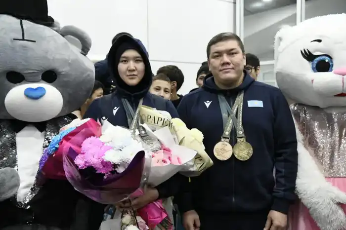 Столичные спортсмены, защищавшие честь страны в Японии, вернулись домой (5)