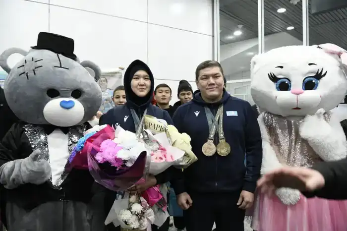 Столичные спортсмены, защищавшие честь страны в Японии, вернулись домой (4)