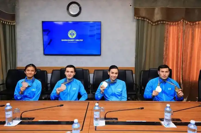 Чемпион Сурдлимпиады в Токио Еркебулан Канафин и его тренер награждены орденом «Құрмет» (5)